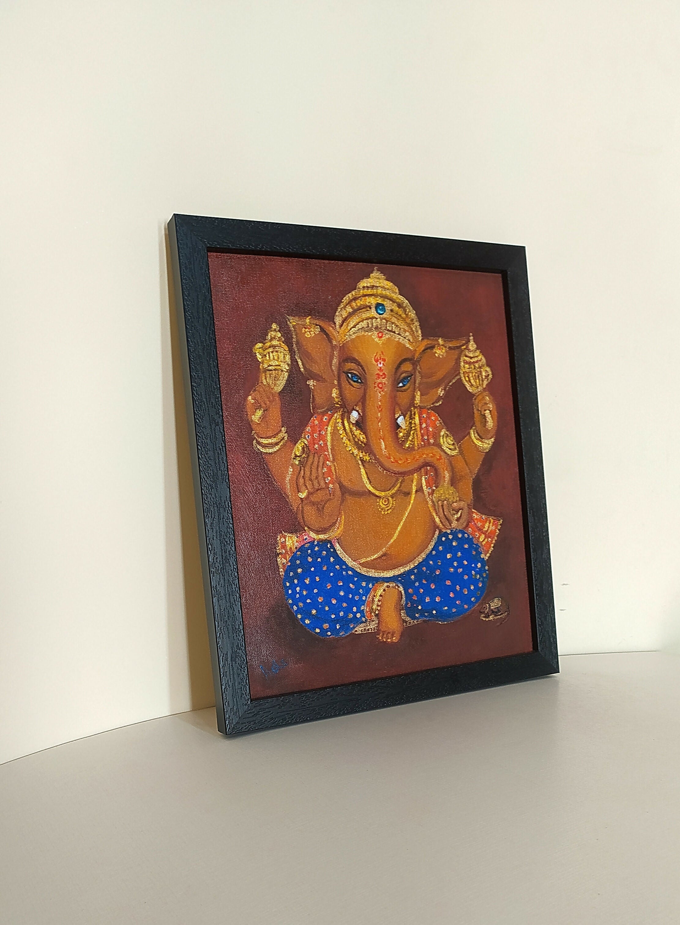 Framed Ganesha Blue eyes frame side view 1726938900243