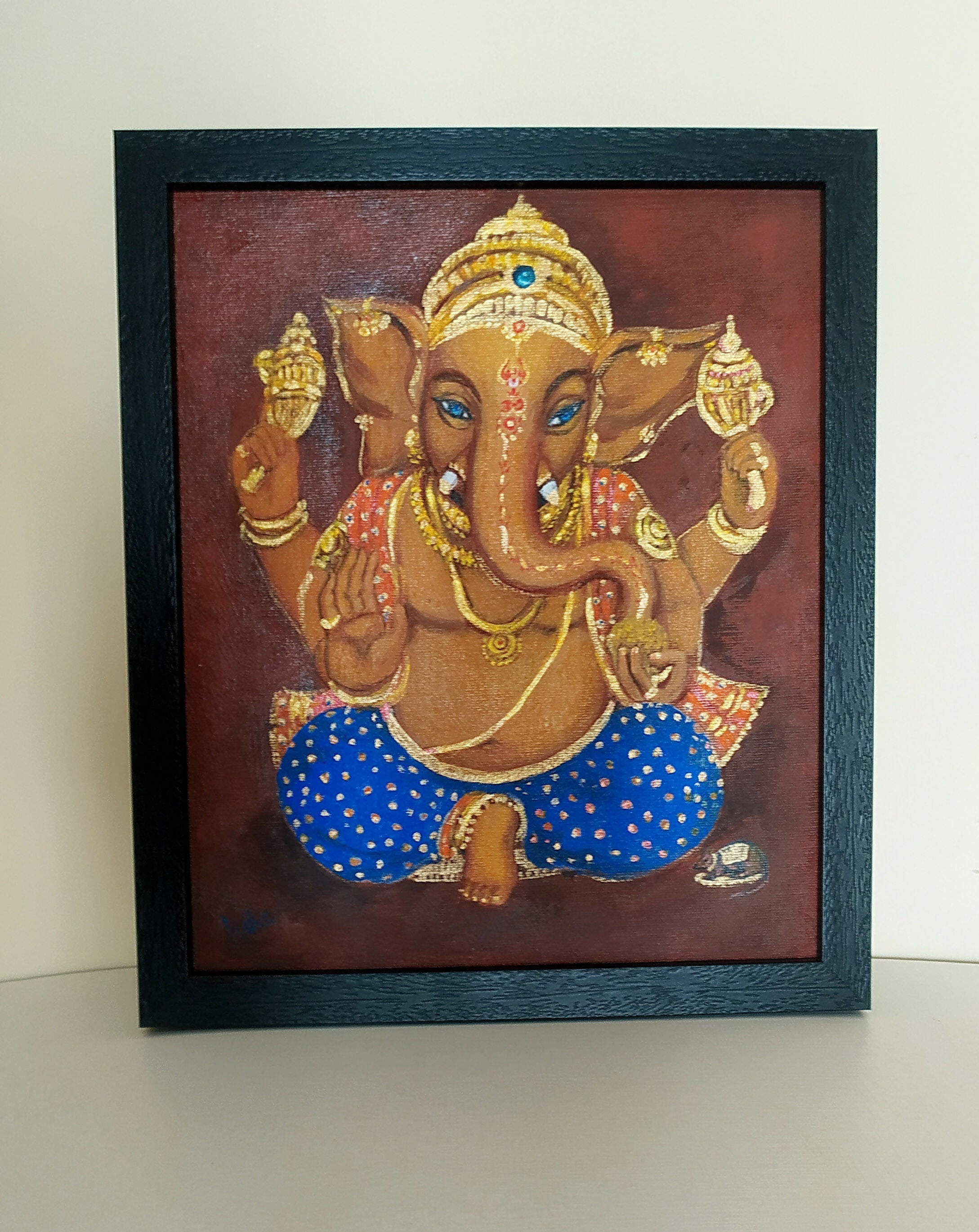 Framed Ganesha Blue eyes frame Frontal view 1726938900243