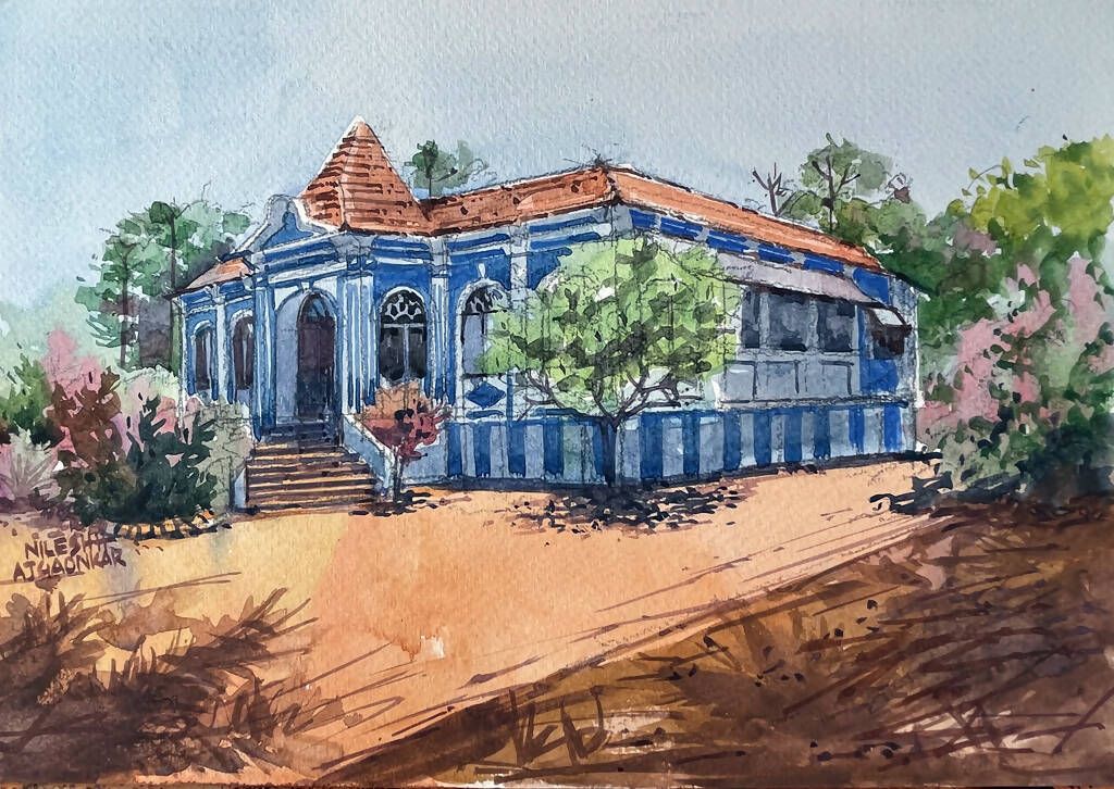 Title: Goan house painted in blue color.