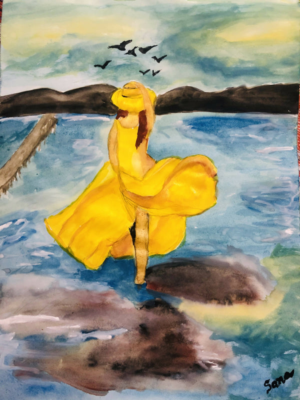 Lady in yellow by the Sea