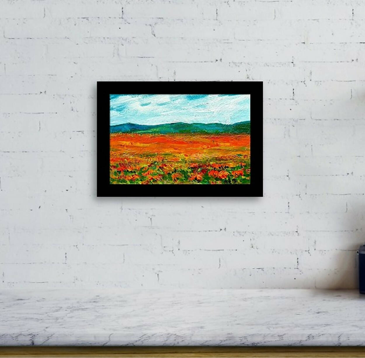 Miniature landscape painting of a flower meadow