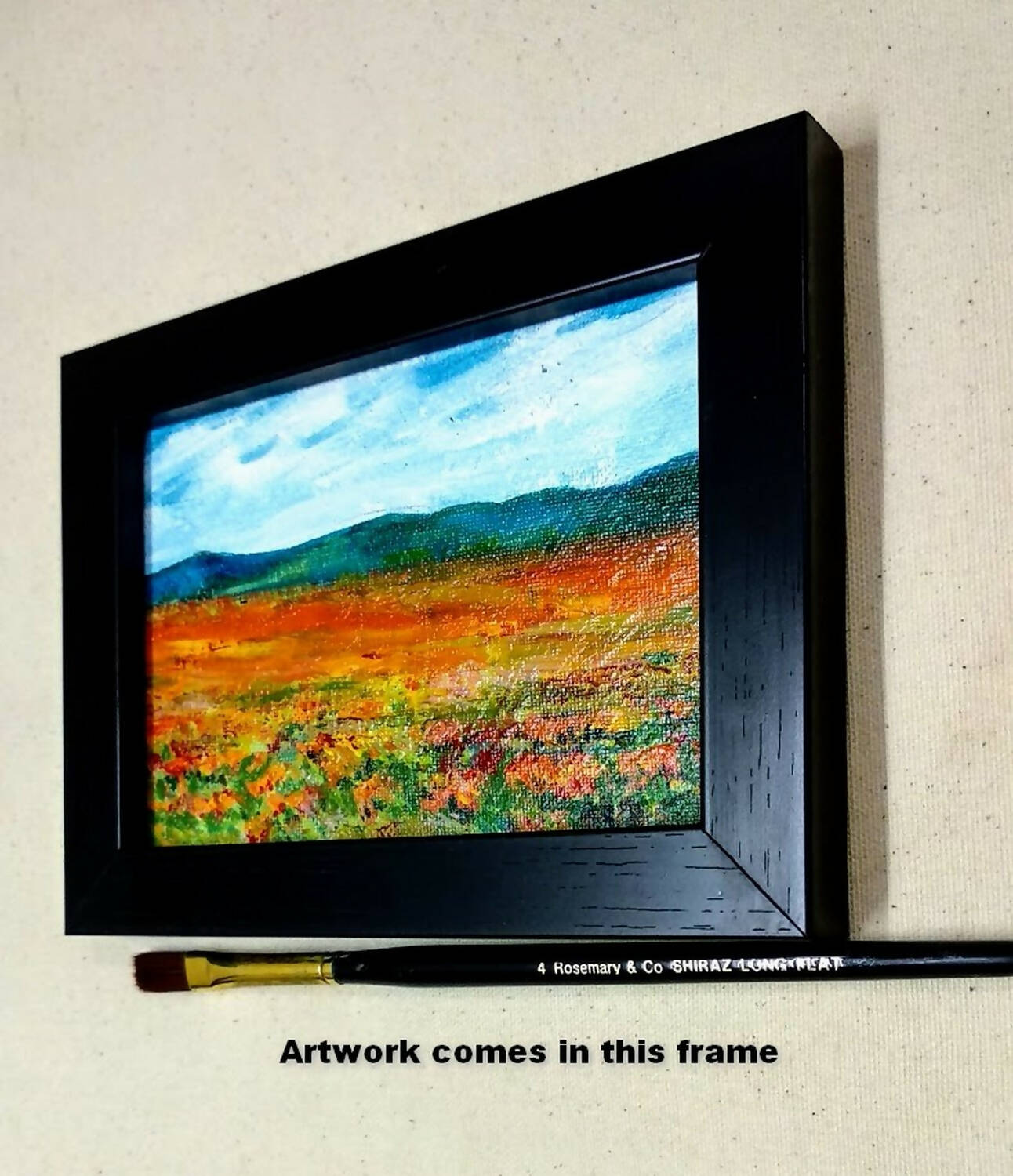 Miniature landscape painting of a flower meadow