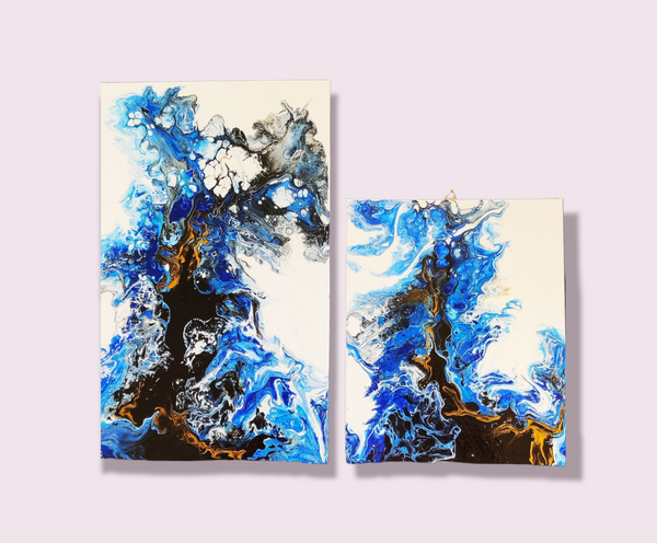A set of 2 canvas board painting using acrylic and pouring medium