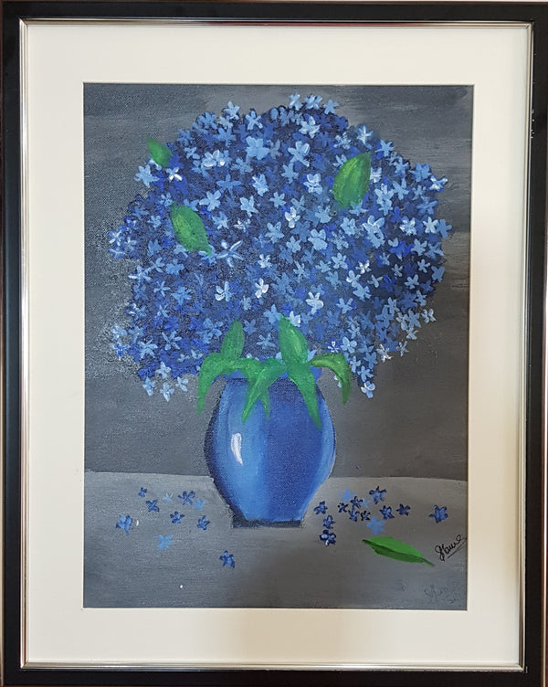 Blue vase with blue flowers