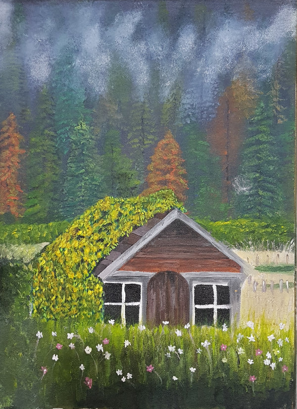 Cabin in the woods with misty background