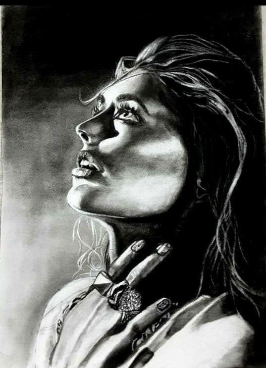 Charcoal painting of woman looking up at the sky