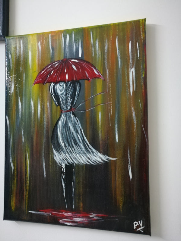 Girl walking in the rain